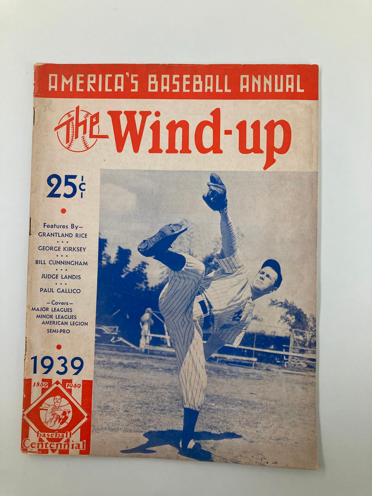 Cover of the 1939 America's Baseball Annual: The Wind-up featuring a pitcher in action. The magazine highlights contributions from Grantland Rice and George Kirksey.