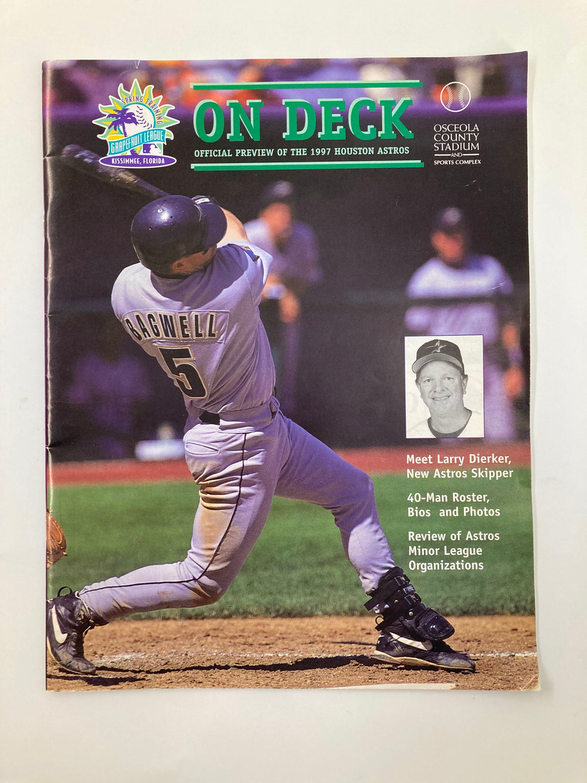 1997 On Deck Official Preview Houston Astros featuring Larry Dierker, the Astros skipper, swinging a bat in action.