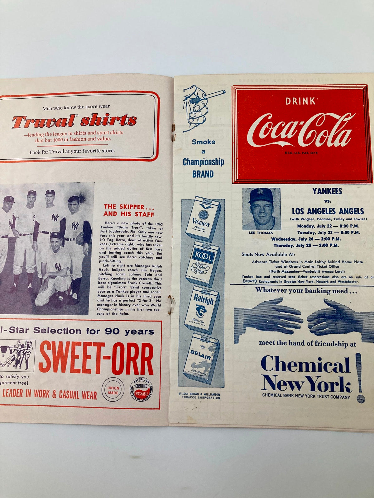Promotional page in the 1963 MLB New York Yankees World Champions Official Program and Scorecard featuring a Coca-Cola advertisement and player images.
