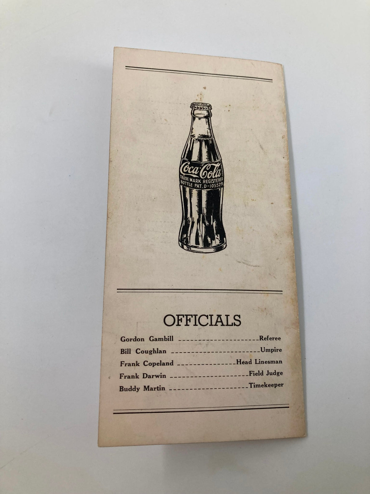 November 29, 1941 Football Central High vs City High Official Program back cover featuring Coca-Cola advertisement and officials section.