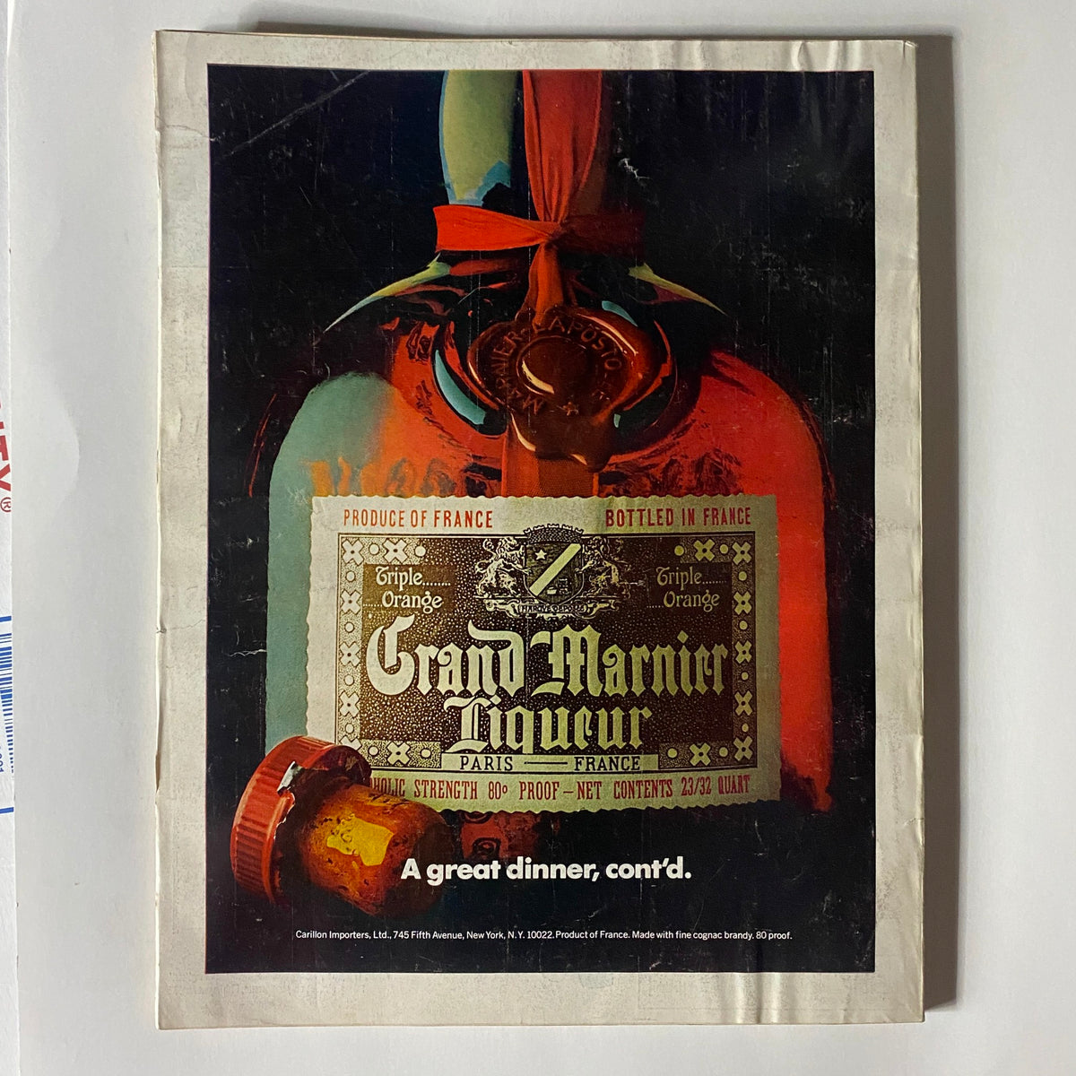 Back cover of VTG Vogue Magazine February 1973 displaying an artistic advertisement for Grand Marnier liqueur.