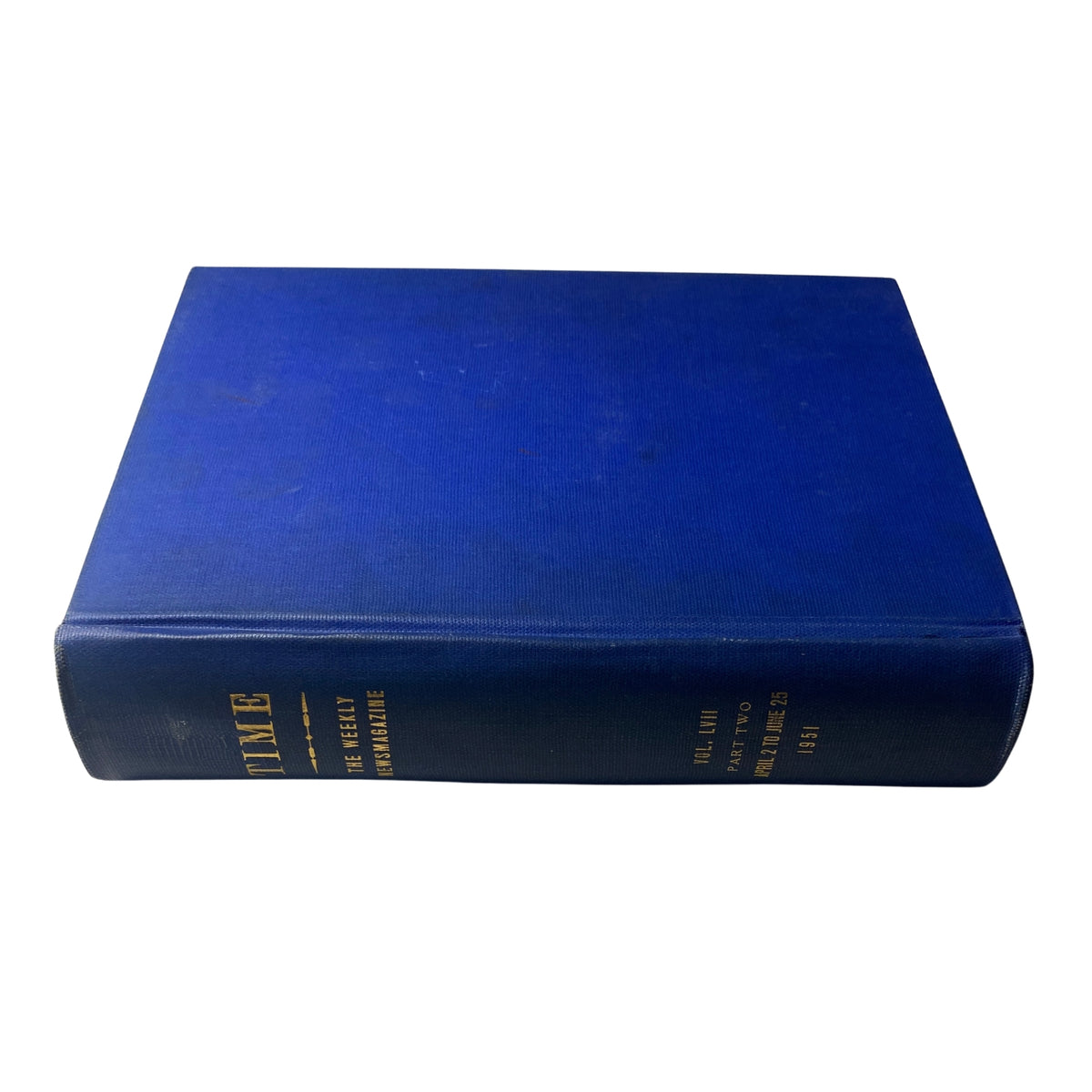Top view of the Time Magazine Library Bound April 1951, displaying the blue cloth cover and title detailing for this historical volume.