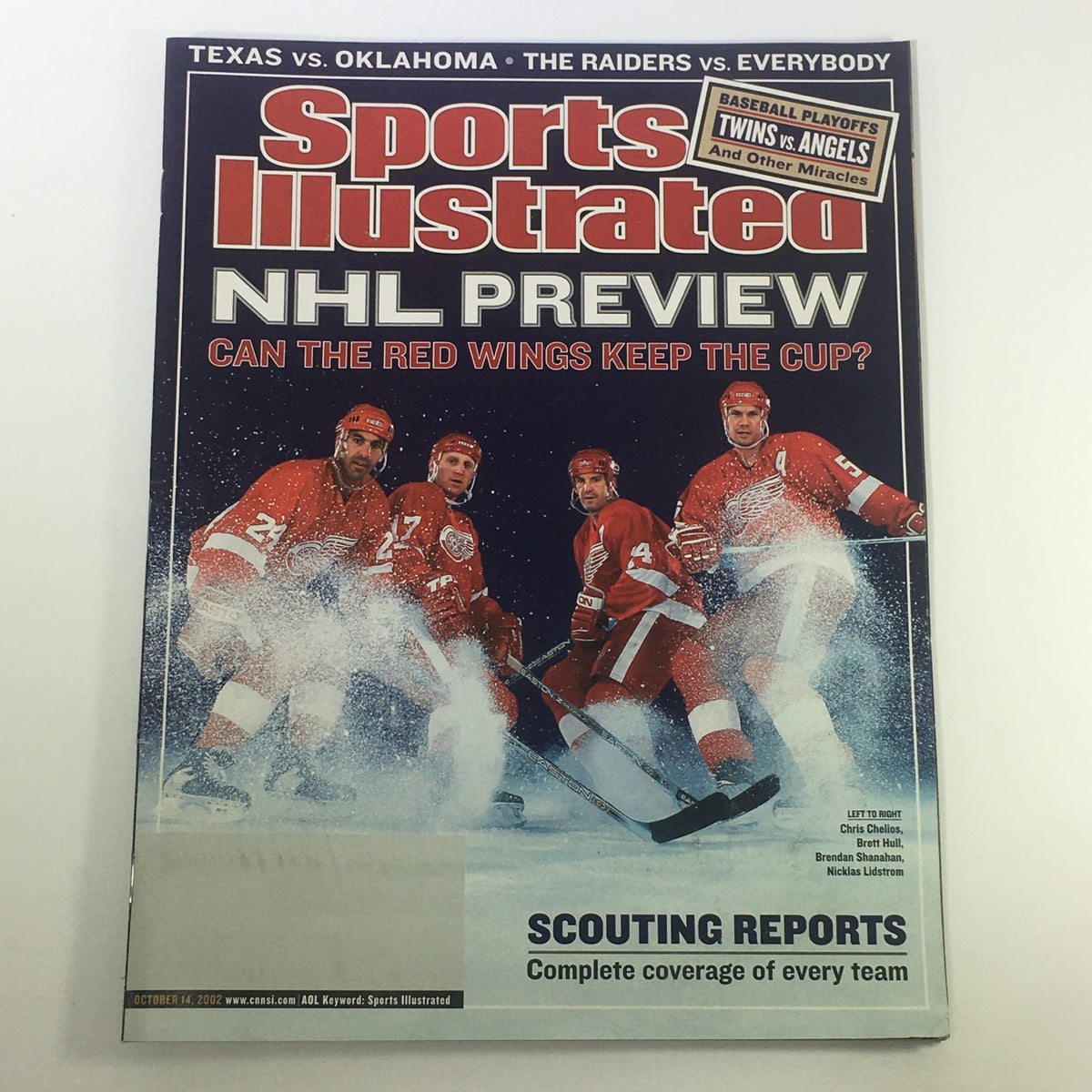 Sports Illustrated Magazine October 14 2002 featuring NHL preview cover with hockey players, including icons Chris Chelios and Brett Hull, highlighting the excitement of professional hockey.