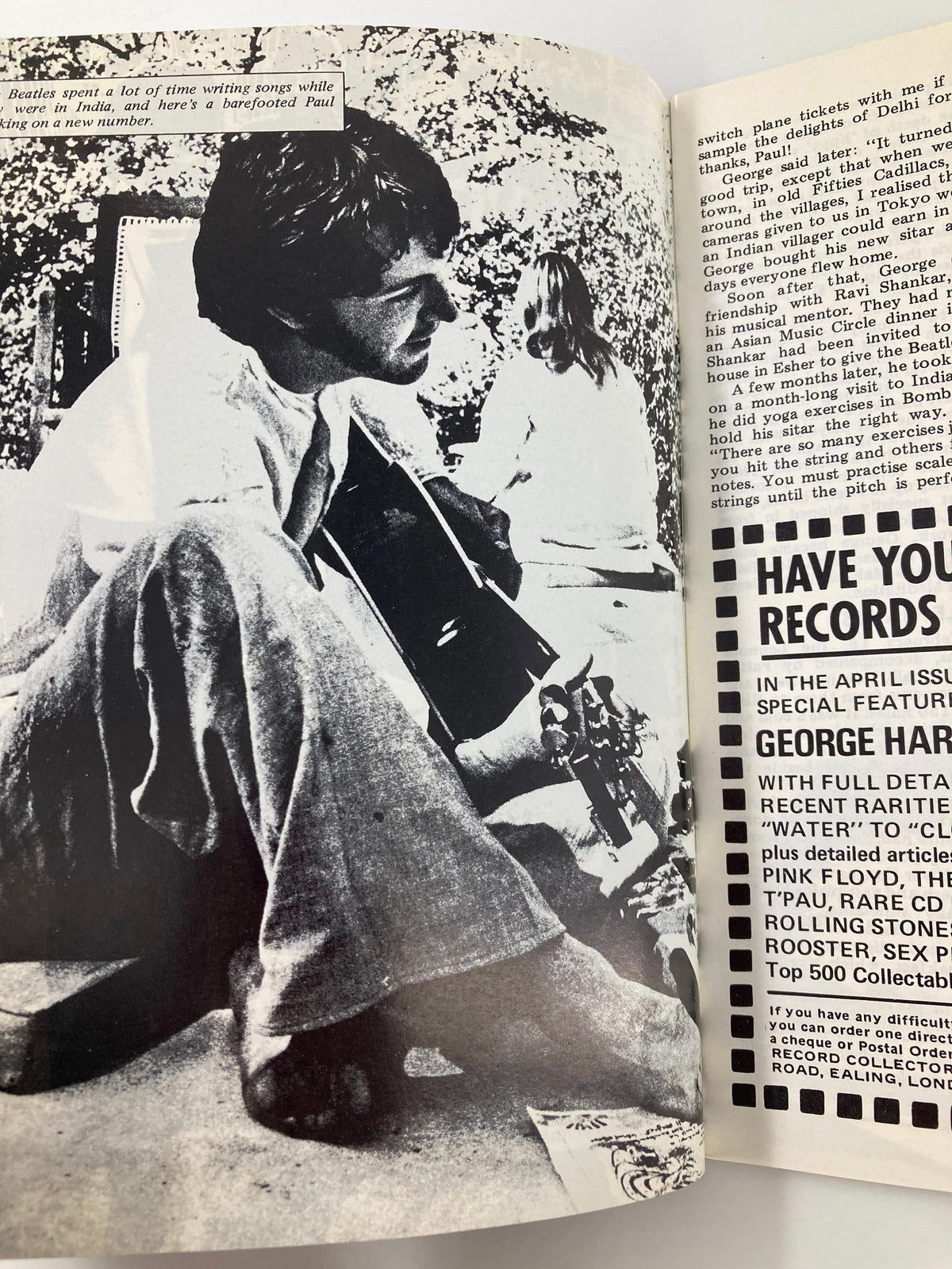 Paul McCartney sitting barefoot and writing songs during The Beatles' stay in India, captured in The Beatles Book Monthly Magazine April 1988.