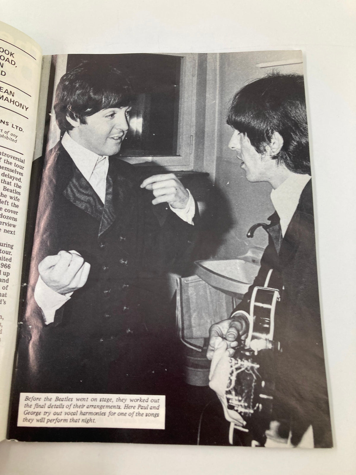Vintage photograph of Paul McCartney and George Harrison during a practice session featured in The Beatles Book Monthly Magazine July 1986, Issue #123.