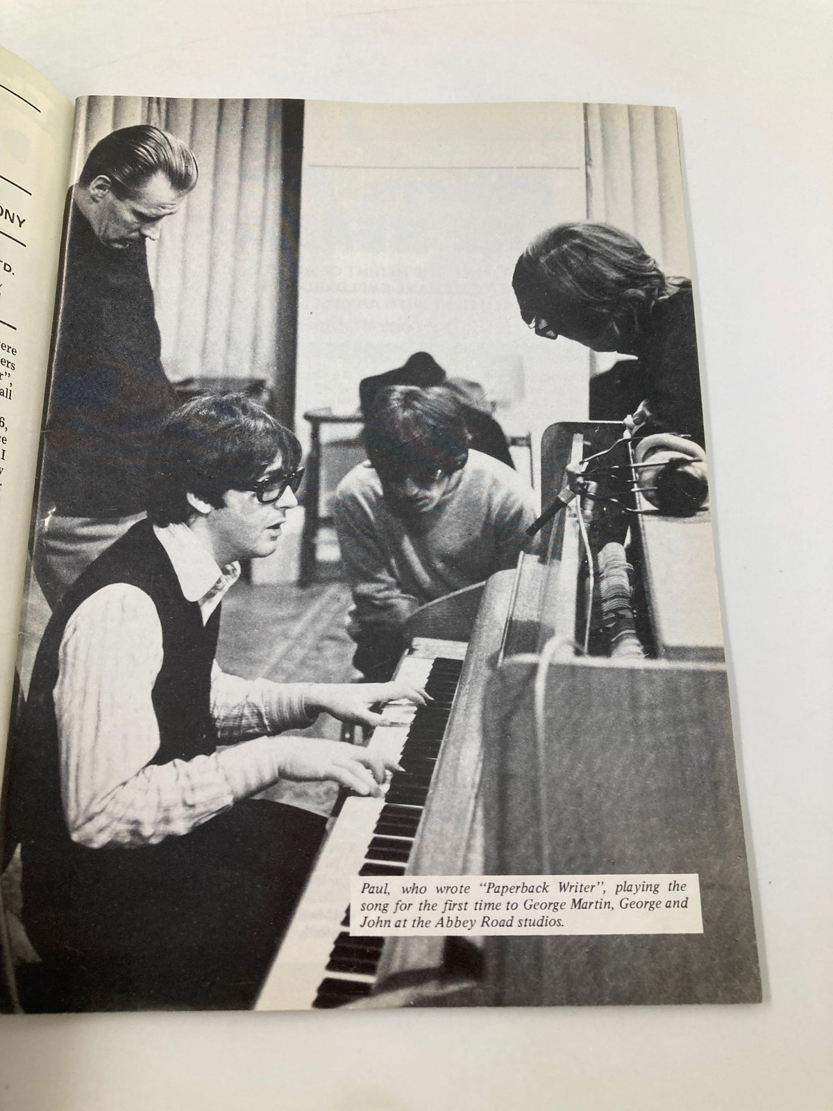 The Beatles Book Monthly Magazine March 1986 #119 featuring Paul McCartney playing piano with George Martin, John Lennon, and another participant at Abbey Road studios.