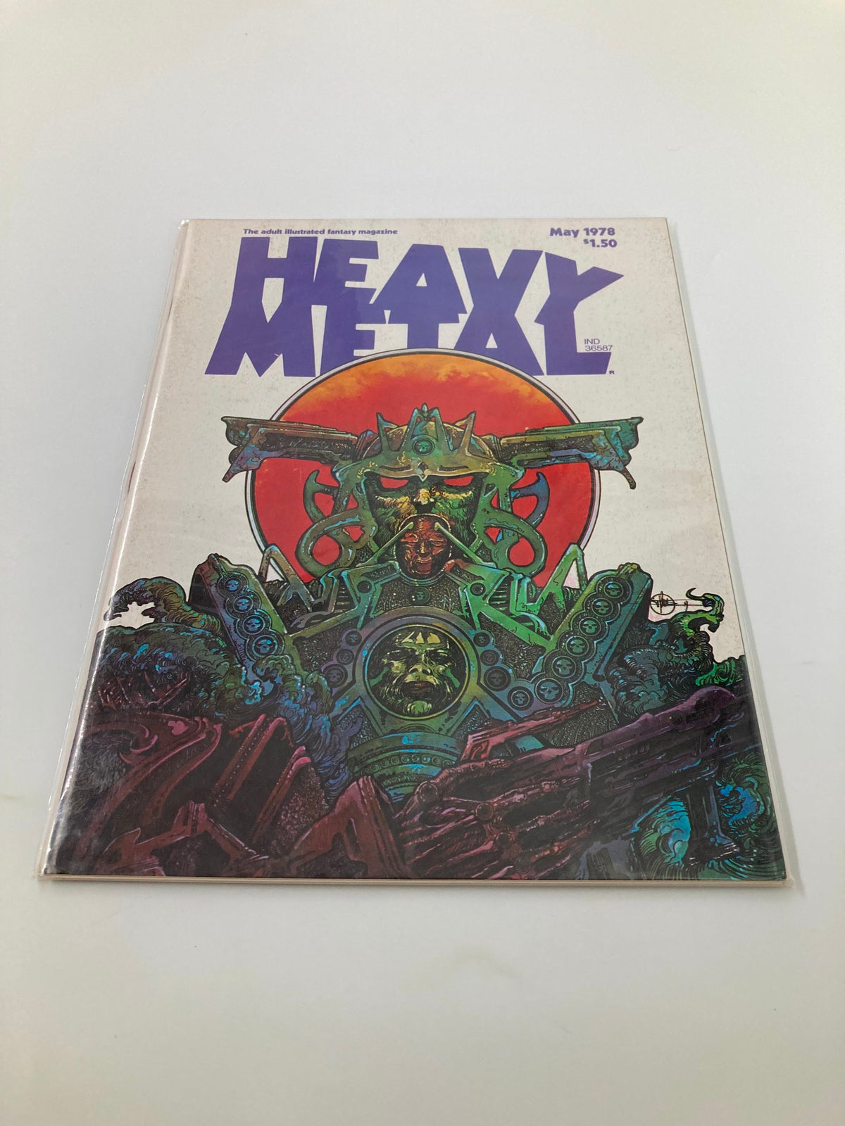 Alternate angle of the cover of VTG Heavy Metal Magazine May 1978 displaying the iconic 'Urm le Fou' artwork by Philippe Druillet with bold colors and designs.