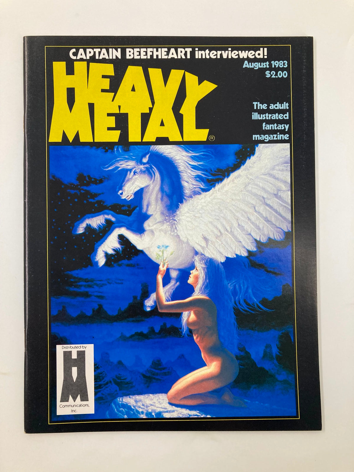 Cover of VTG Heavy Metal Magazine from August 1983 featuring stunning artwork of a winged unicorn and a nude woman, epitomizing the magazine's adult illustrated fantasy theme.