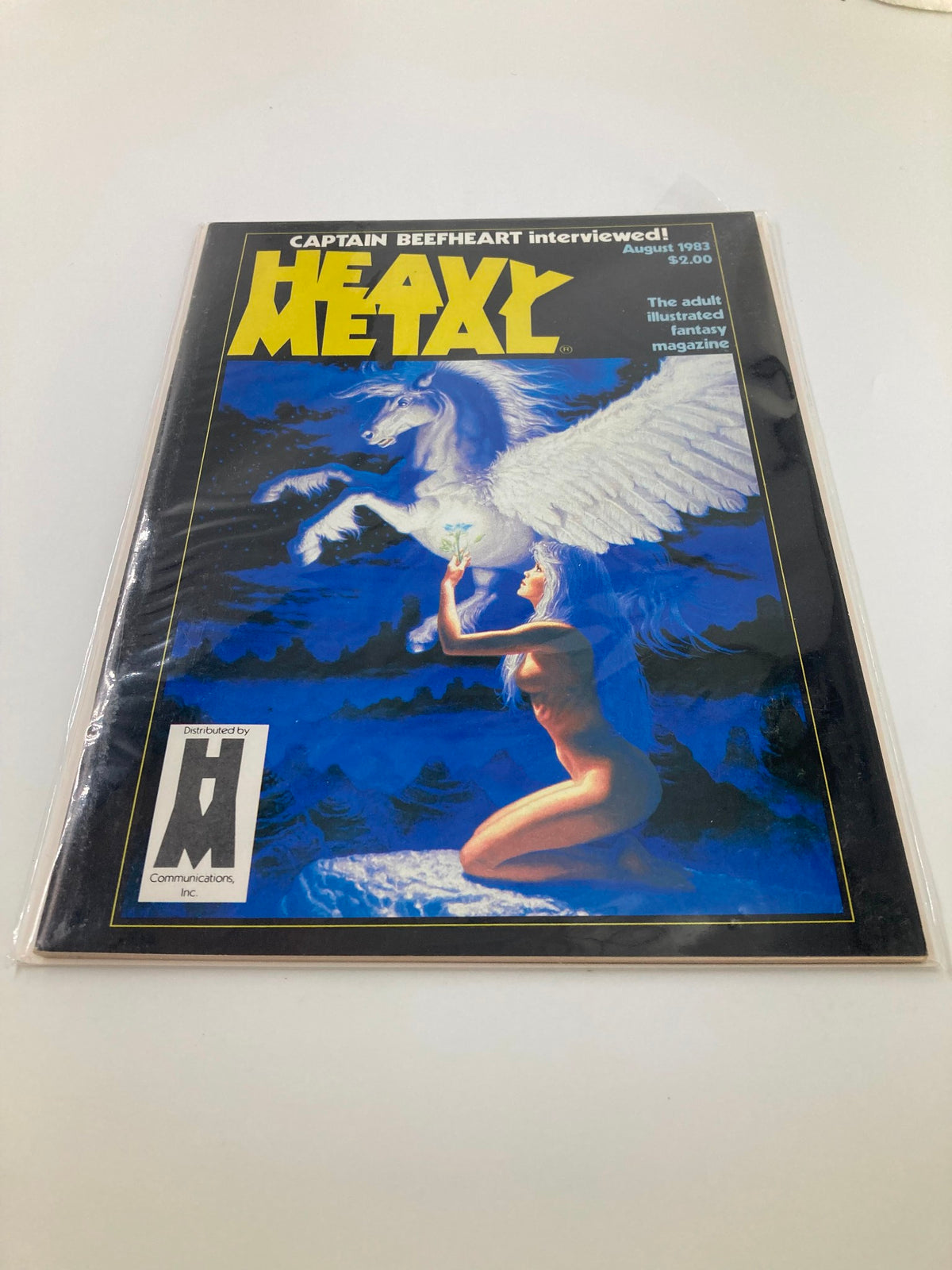 Cover of VTG Heavy Metal Magazine August 1983 featuring striking artwork of a winged unicorn and a female figure, part of the collector's series.