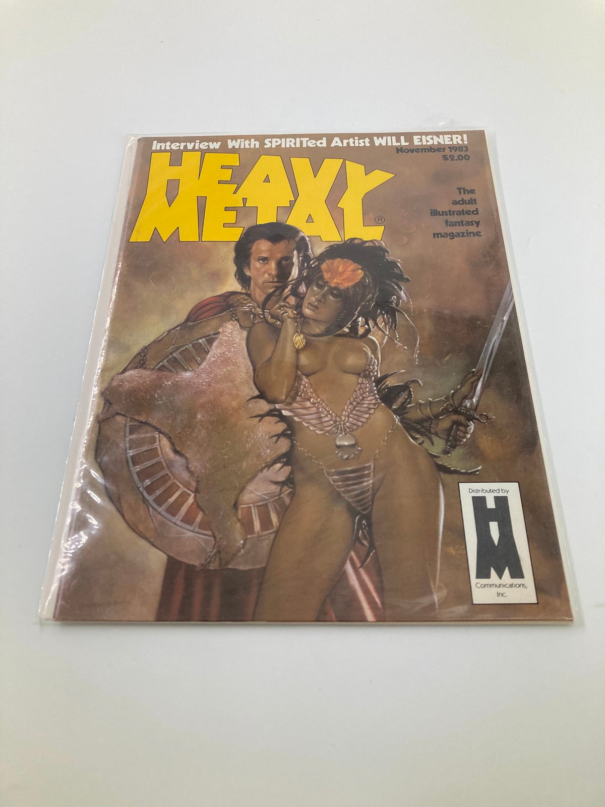 VTG Heavy Metal Magazine November 1983 titled 'The Fright of Great Spectacle', displayed in protective cover, highlighting its near mint condition.
