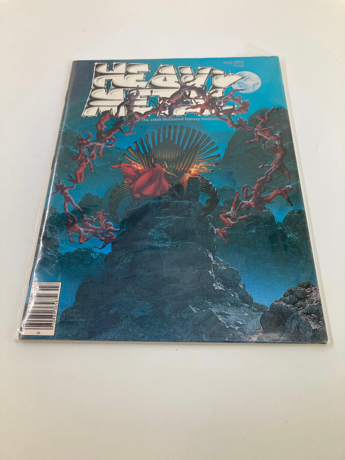 Back view of VTG Heavy Metal Magazine July 1979 showcasing the bold cover art of 'Night on Bald Mountain'. The magazine is well-preserved in protective plastic.