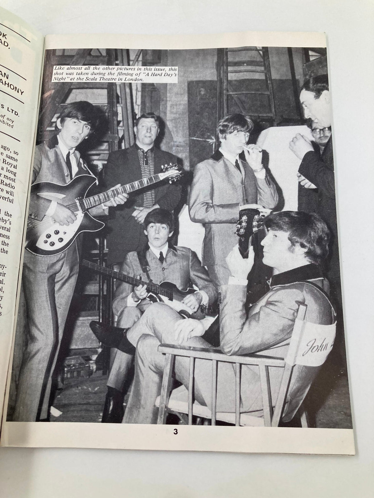 Black and white photograph of The Beatles during the filming of 'A Hard Day's Night', included in 'The Beatles Book Monthly Magazine', May 1984, Issue #97.