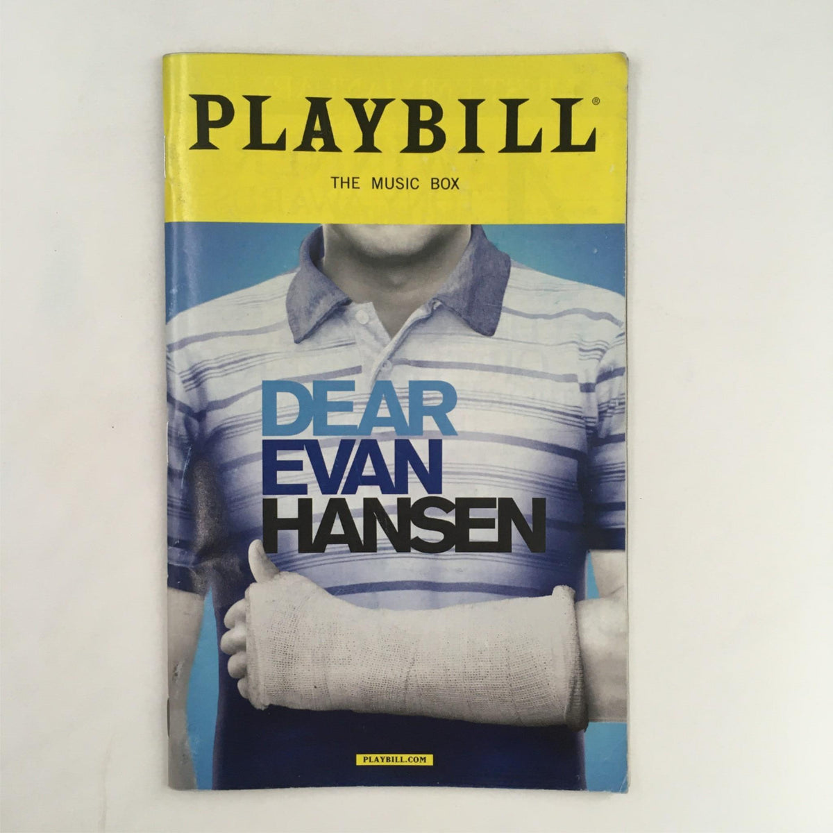 2016 Playbill Dear Evan Hansen featuring a cast member with a cast, showcasing the iconic cover at The Music Box theatre.