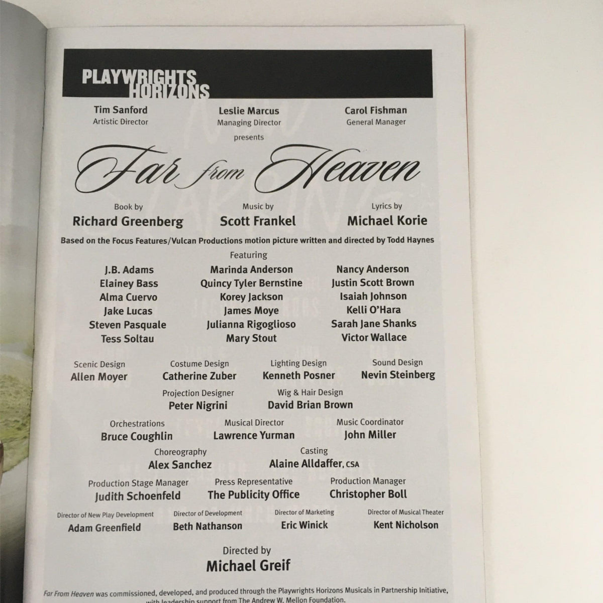 2013 Playbill for 'Far From Heaven' by Michael Greif at Playwrights Horizons, showcasing cast and production credits, highlighting musical contributors and creative team members involved in this theatrical production.