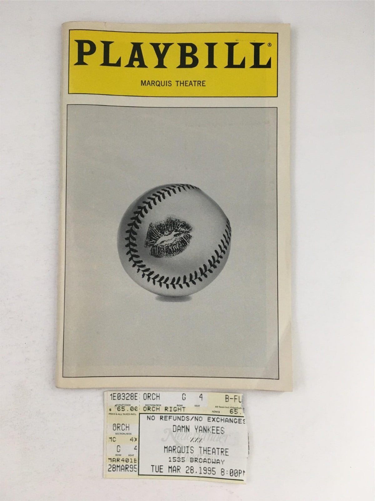 1995 Playbill for Damn Yankees by Jack O'Brien featuring the cover art and an attached ticket from the Marquis Theatre performance.