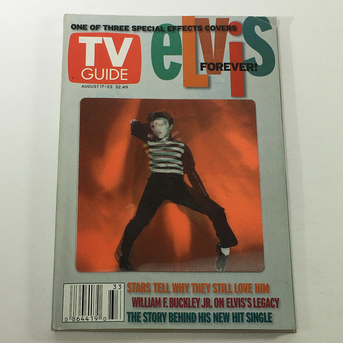 Cover of VTG TV Guide Magazine August 17-23 2002 featuring Elvis Presley in a striking performance pose, alongside a headline about William F. Buckley Jr. This collectible magazine highlights the intersection of entertainment and political discourse, making it a significant piece of pop culture history.
