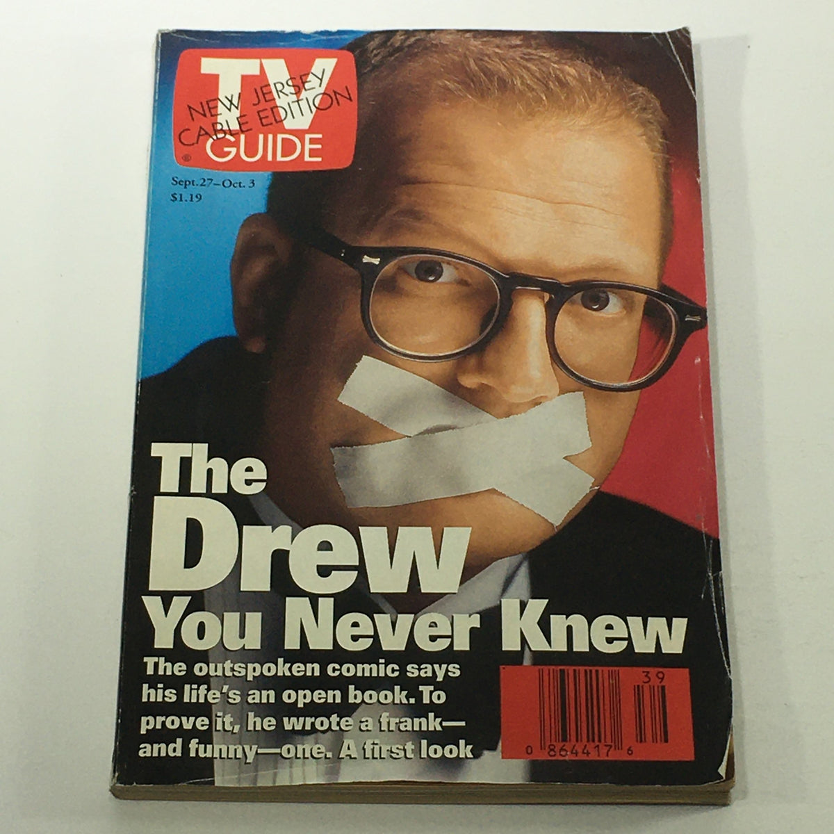 Vintage TV Guide Magazine Cover featuring Drew Carey, September 27-October 3, 1997, showcasing an iconic image of the comedian with tape over his mouth, highlighting the issue's humorous theme.