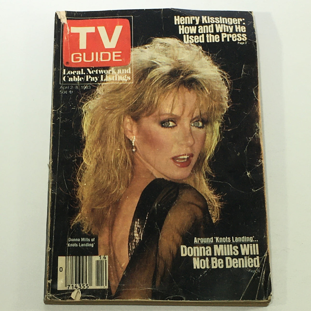 Front cover of the VTG TV Guide Magazine April 2-8 1983 featuring actress Donna Mills, with highlights on Henry Kissinger and 'Knots Landing'.