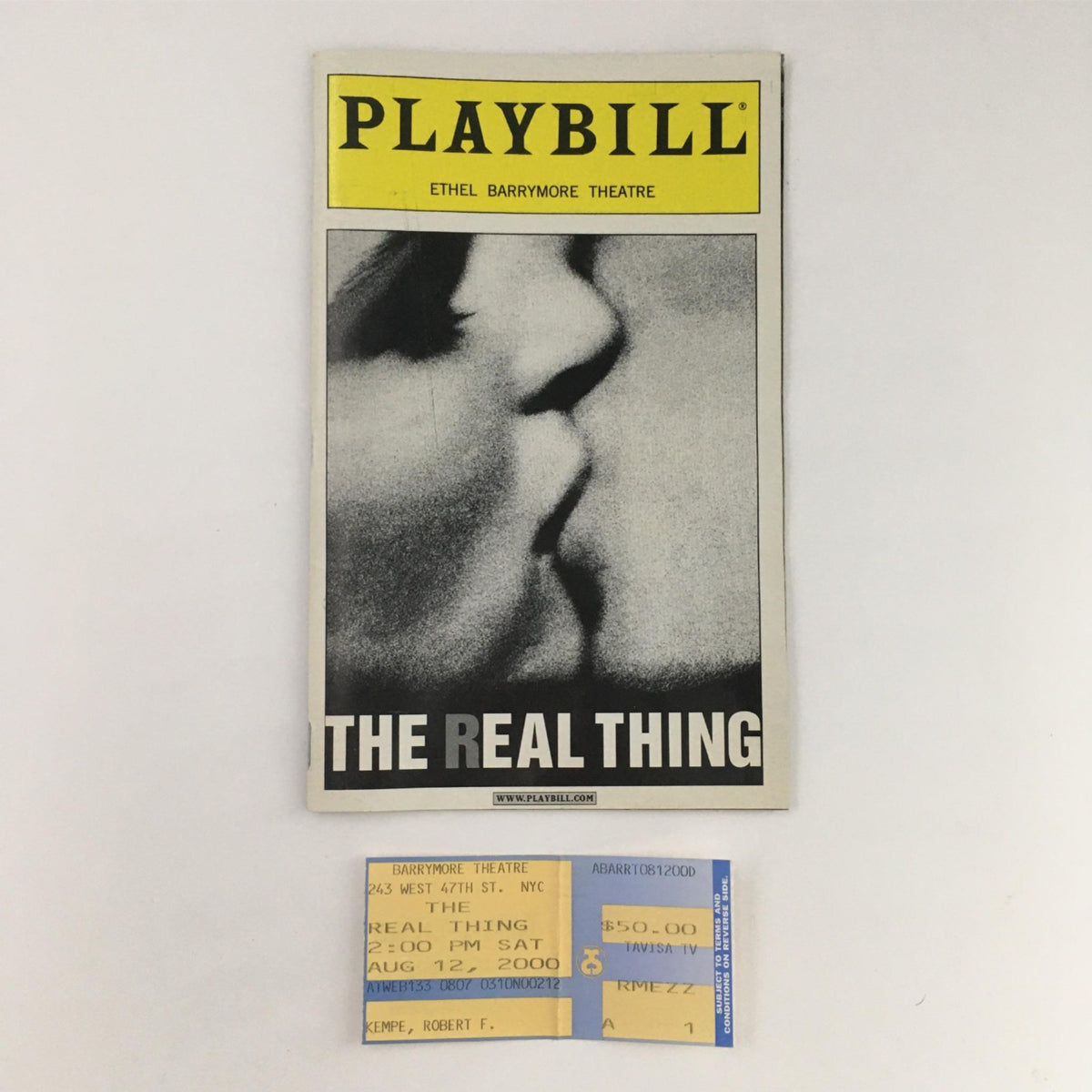 2000 Playbill The Real Thing showcasing the front cover featuring a dramatic image, from the Ethel Barrymore Theatre, alongside an original ticket.
