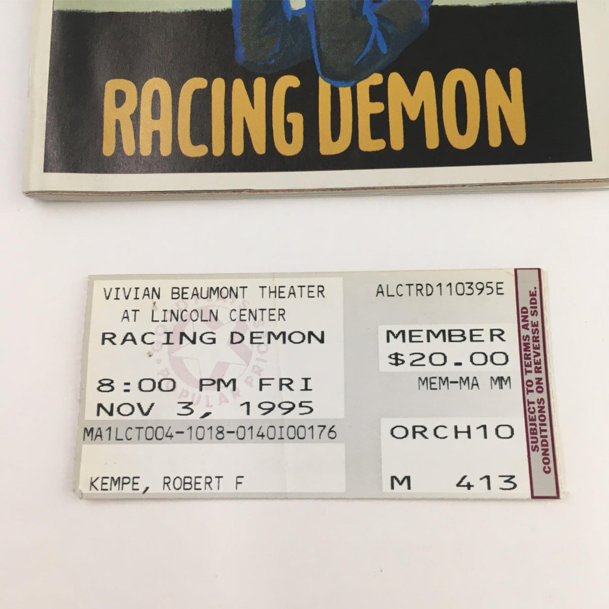 Close-up of original ticket for the 1995 Playbill of Racing Demon at Lincoln Center Theatre, showcasing date and pricing information.