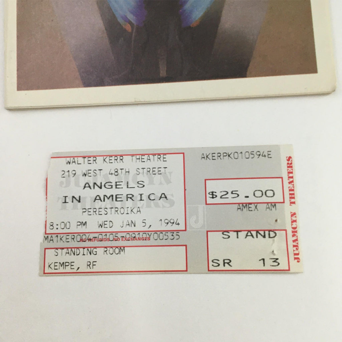 Close-up of the ticket stub from the 1994 Playbill of 'Angels in America' at Walter Kerr Theatre, displaying performance details and seating information.
