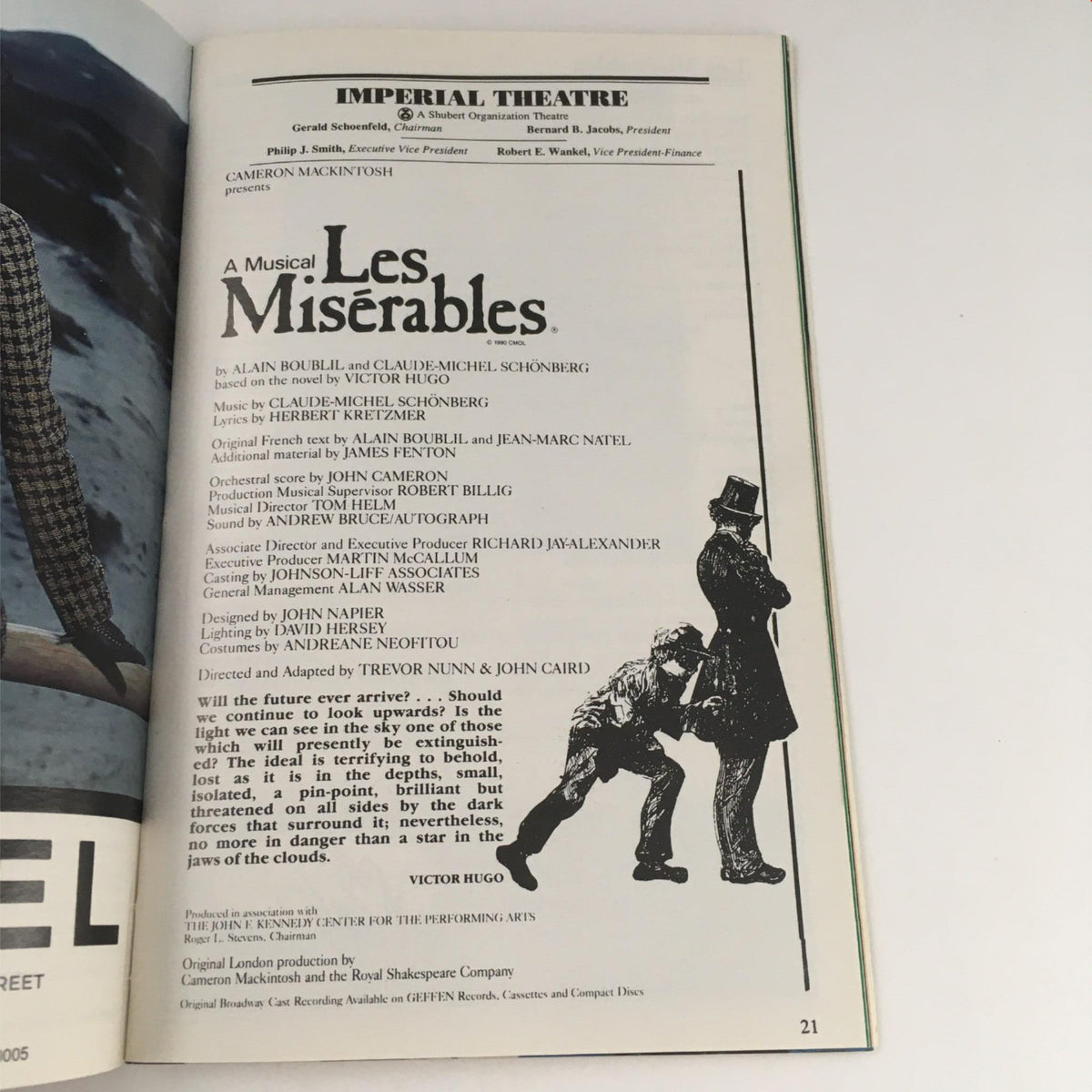1995 Playbill Les Misérables by Victor Hugo, featuring an advertisement page for the musical with a black and white illustration, embodying classic Broadway design elements.