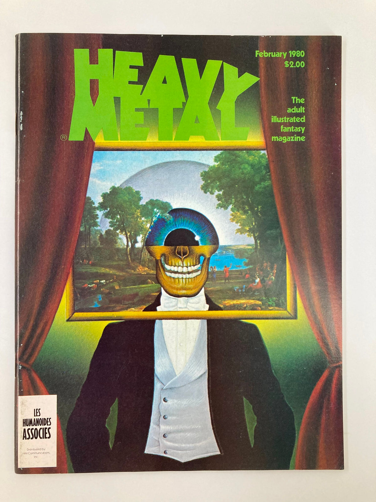 February 1980 issue of Heavy Metal Magazine featuring eye-catching cover art with a skeletal figure holding a picture frame. The magazine showcases the stories of Mr. Interlocutor and Mr. Bones.