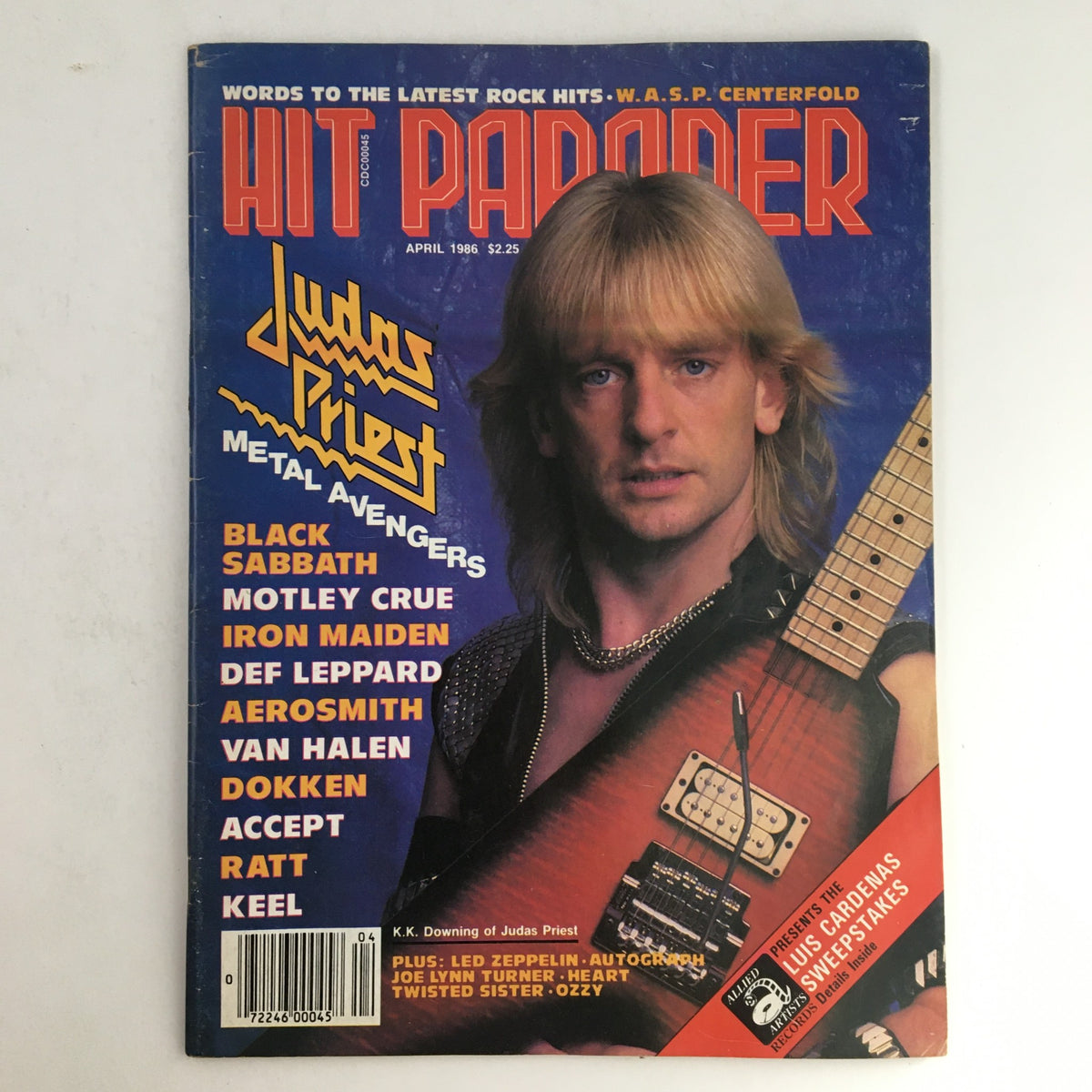 Hit Parader Magazine April 1986 cover featuring K.K. Downing of Judas Priest, showcasing the magazine's title and the featured metal bands.