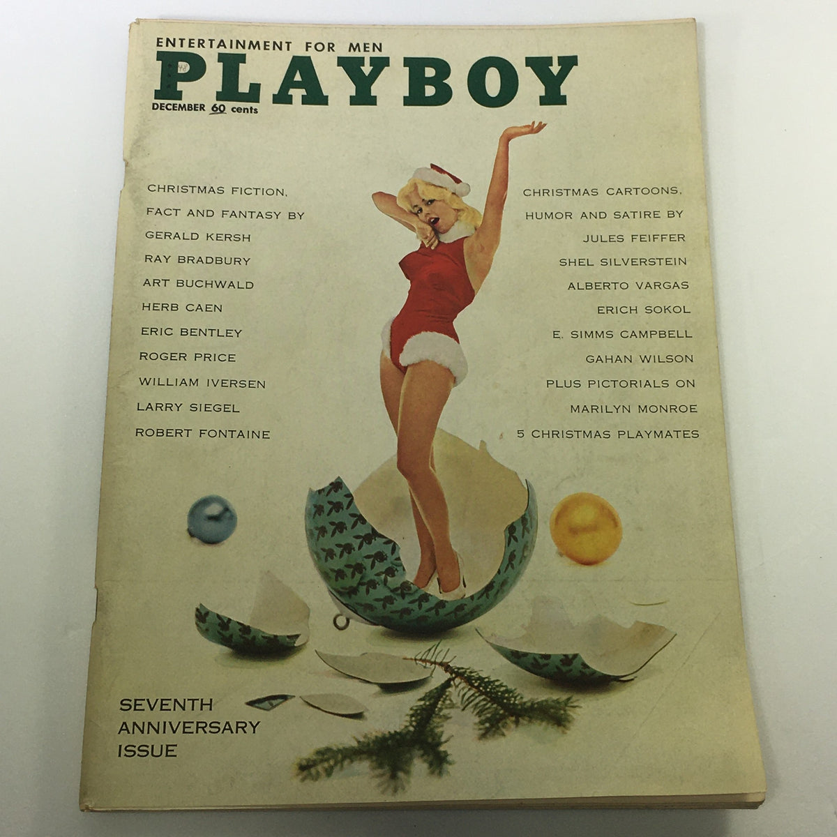 VTG Playboy Magazine December 1960 cover featuring a blonde model in a red outfit, celebrating the Seventh Anniversary Issue, with details on Christmas fiction and pictorials.