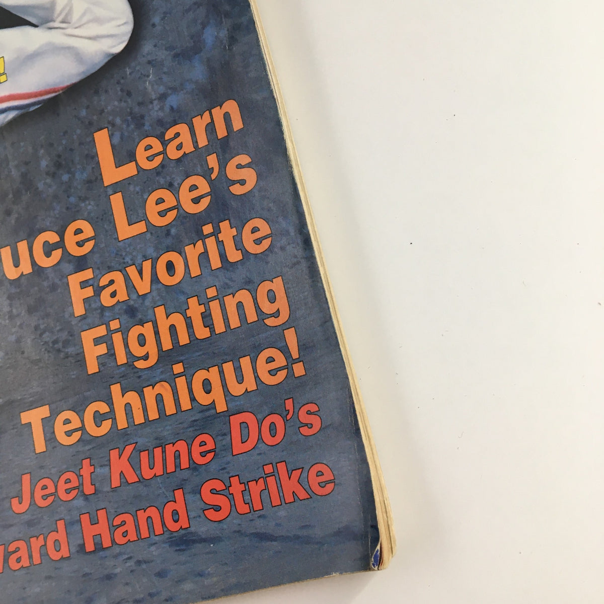 Close-up of the cover text from Black Belt Magazine July 1994, highlighting Bruce Lee's favorite fighting technique, Jeet Kune Do.