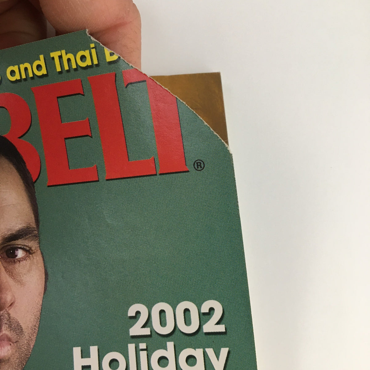Close-up of Black Belt Magazine December 2002 Vol 40 #12 showcasing the title and holiday features, including Joe Rogan's image, emphasizing its collectible nature.