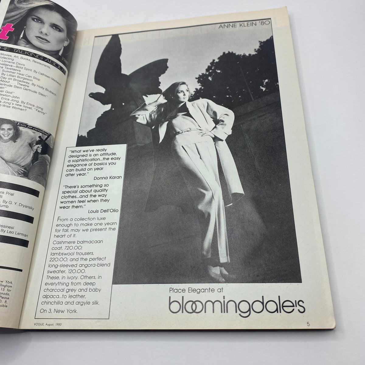 Vogue Magazine August 1980 featuring a stunning black and white fashion advertisement for Anne Klein, showcasing a model donning elegant attire against a backdrop with artistic elements.