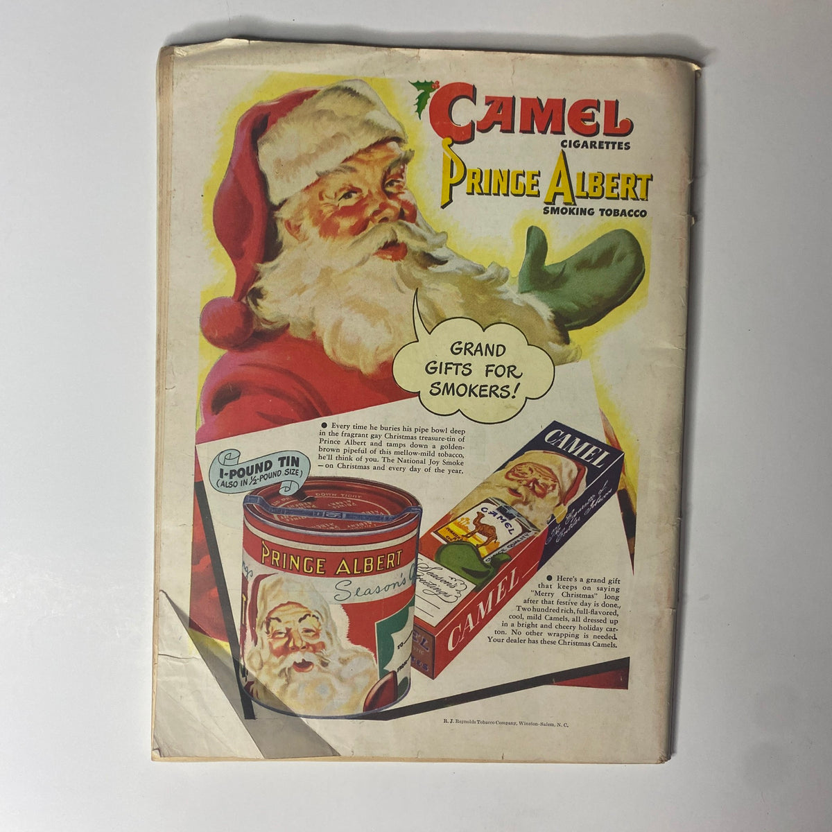 Vintage advertisement featuring Santa Claus promoting 'Camel' cigarettes and 'Prince Albert' smoking tobacco. The ad includes the phrase 'Grand Gifts for Smokers!' in reference to holiday gifting. This content accompanies the Time Magazine December 9, 1946, Vol 48 No. 24, featuring Russia's Andrei Zhdanov on the cover.