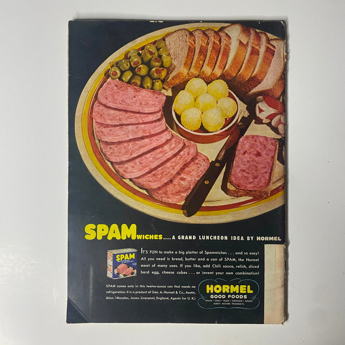 Vintage advertisement for Hormel Spam, highlighting a platter with Spam sandwiches, olives, and side dishes, promoting the easy preparation of meals.