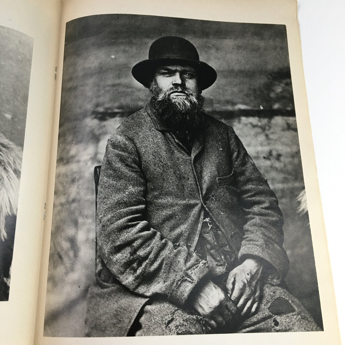 Vintage portrait featured in Creative Camera Magazine May 1976, showcasing a man dressed in early 20th-century clothing. The photograph emphasizes traditional portraiture techniques, reflecting the era's photographic history.