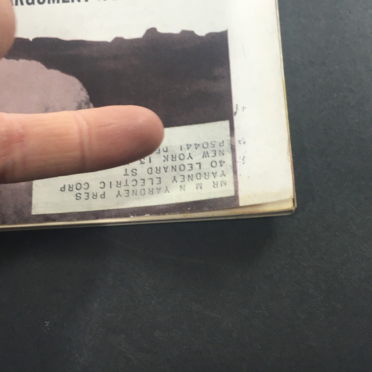 Close-up detail of the back cover of VTG U.S. News & World Report Magazine dated August 15, 1960, highlighting the address label and part of the magazine's historical imagery, related to the article 'Fateful Agreement 15 Years Ago.'