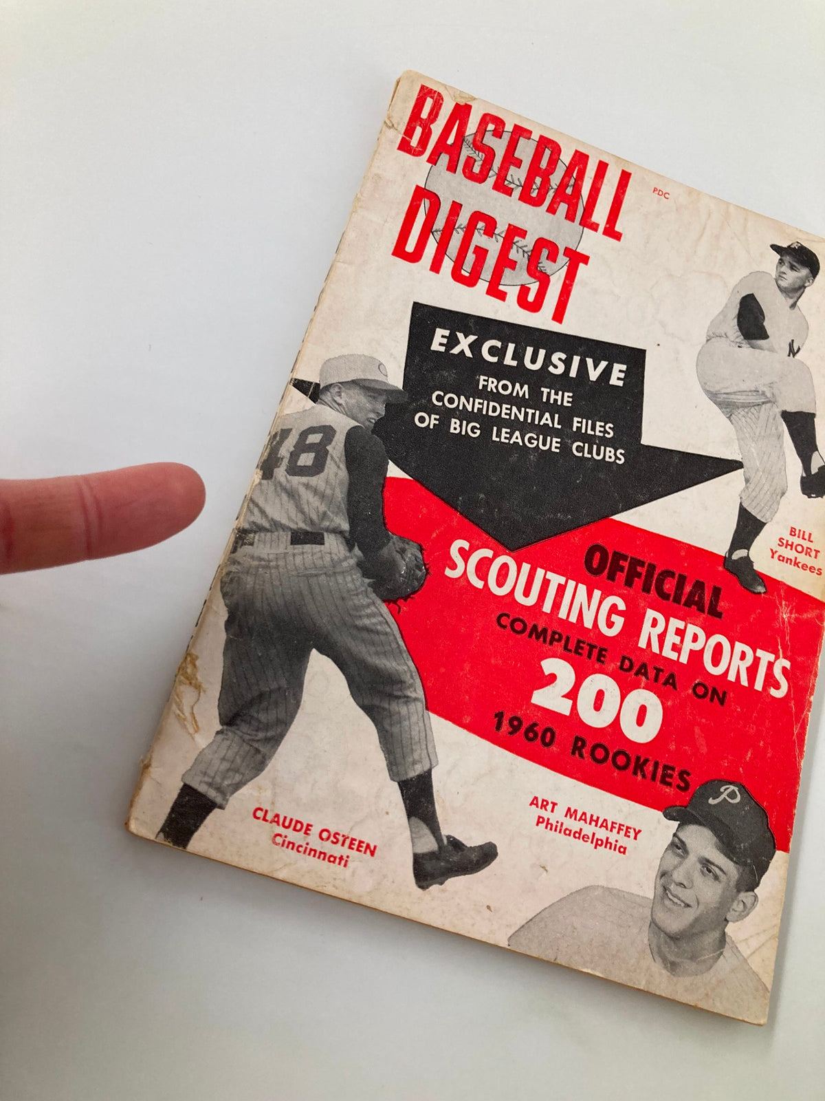 Close-up of the cover of VTG Baseball Digest March 1960, showing Bill Short and Claude Osteen along with the magazine's title and features.