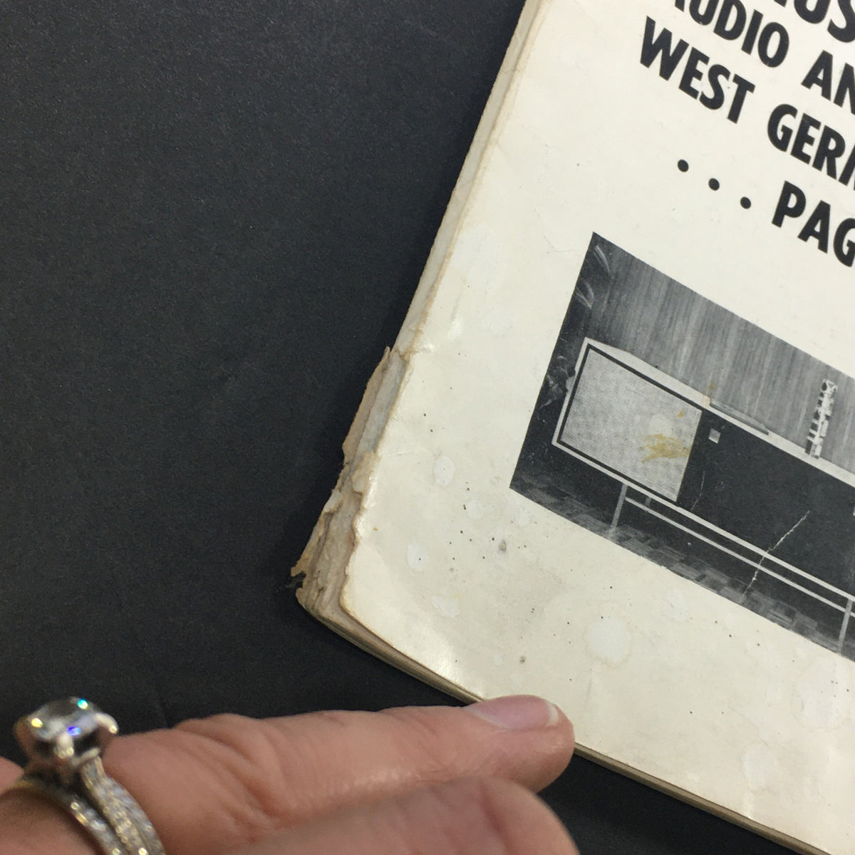 Detail of VTG Audio and Music Magazine November 1964 showing the corner wear and image of an audio system, emphasizing its vintage character.