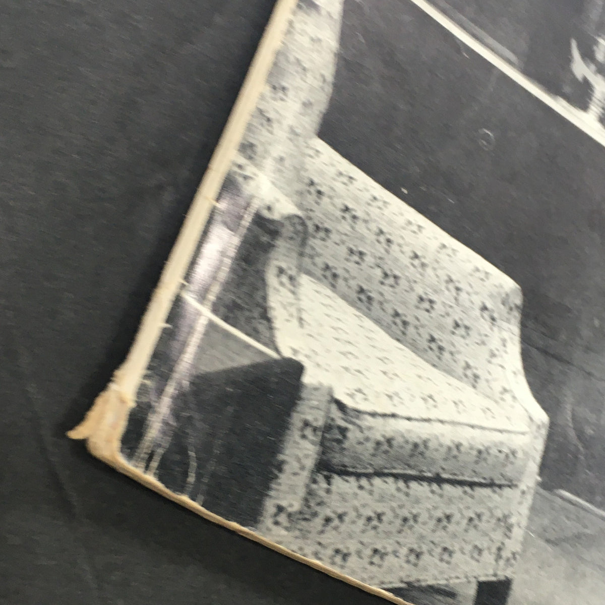 Close-up image highlighting a vintage corner of the VTG Audio and Music Magazine December 1963 cover, showing intricate upholstery and wear details.