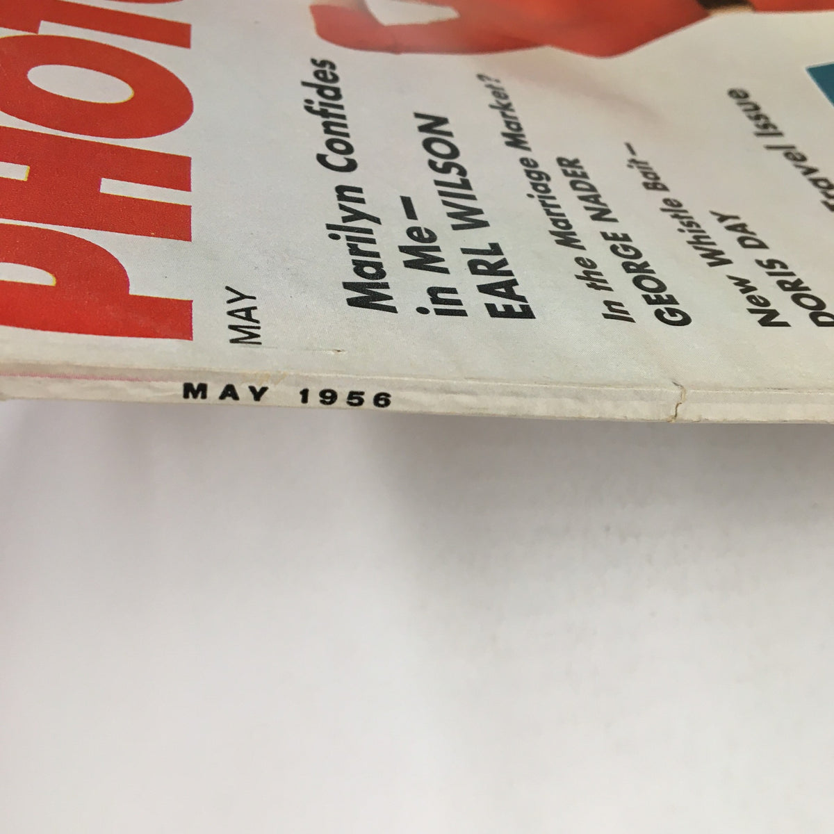 Photoplay Magazine May 1956 cover showcasing vibrant title and date, highlighting articles featuring Hollywood stars.