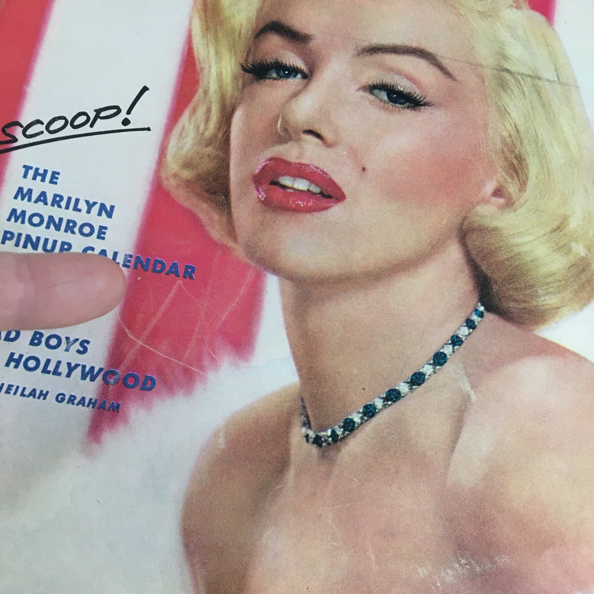 Cover of Photoplay Magazine December 1953 featuring The Marilyn Monroe Pinup Calendar for 1954, showcasing Monroe's glamorous portrait with a striking necklace and vibrant colors.
