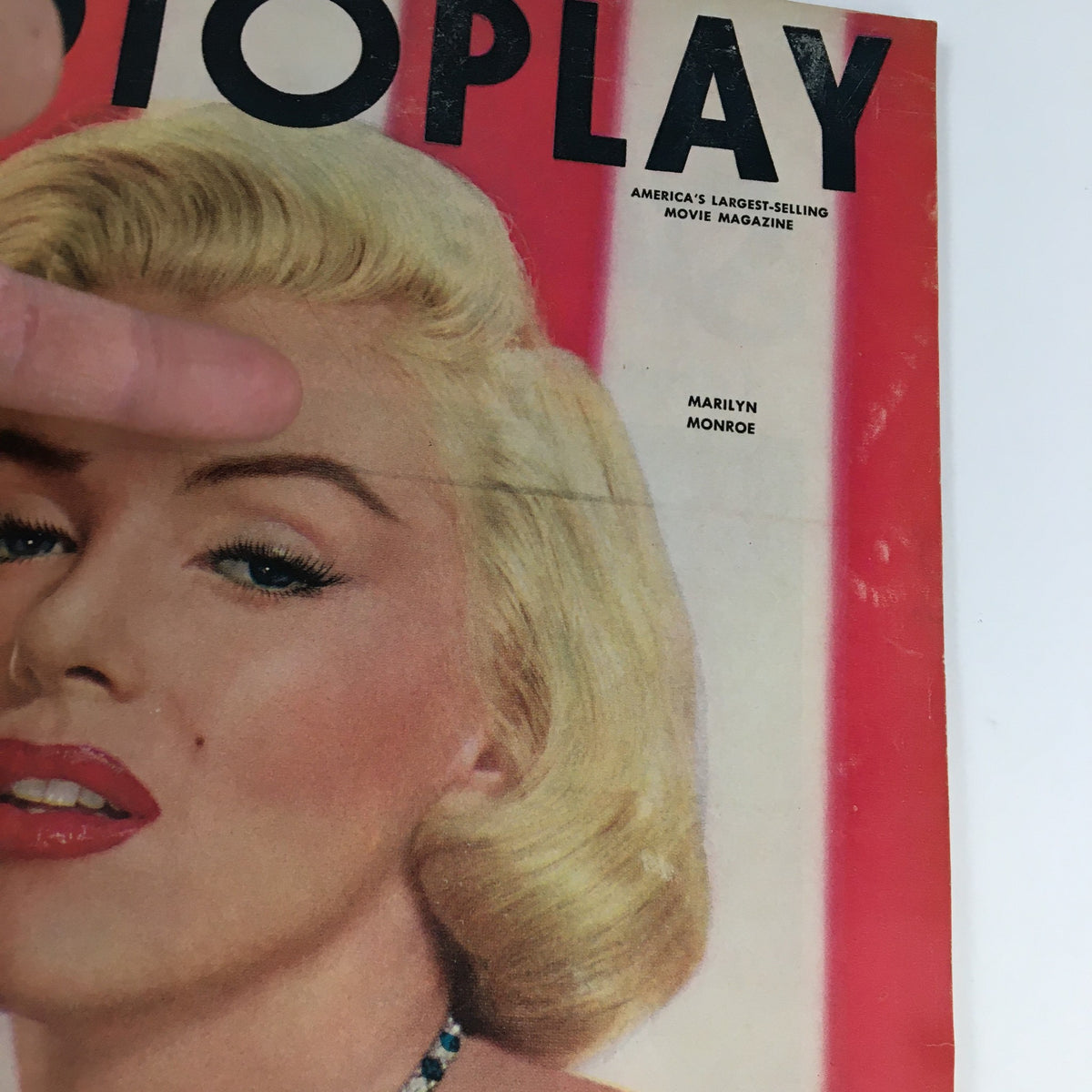 Cover of Photoplay Magazine December 1953 featuring Marilyn Monroe, showcasing classic Hollywood glamour and the Marilyn Monroe Pinup Calendar for 1954.