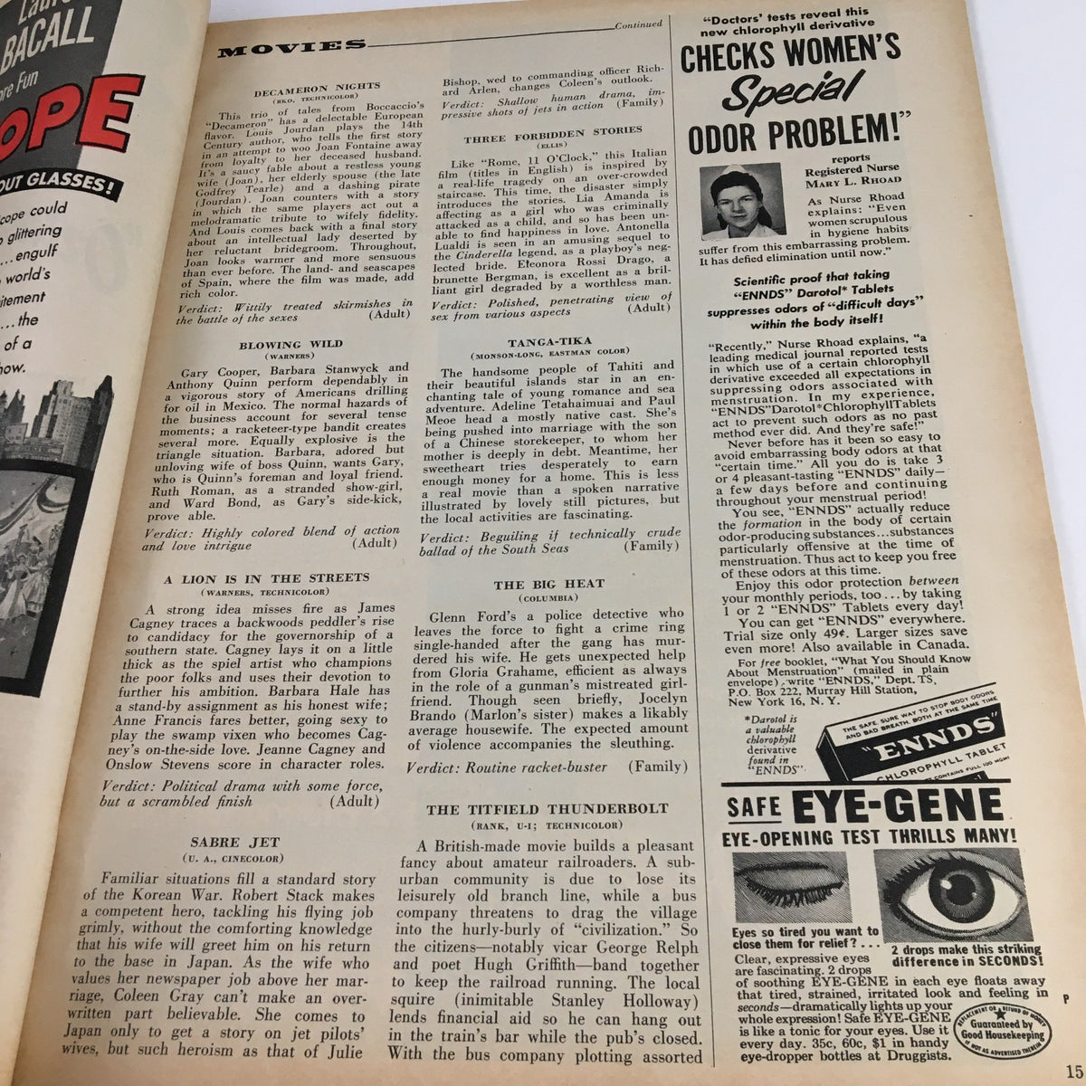 Continuation of movie reviews in Photoplay Magazine December 1953, providing insights into films, including 'How to Marry a Millionaire' featuring Marilyn Monroe.