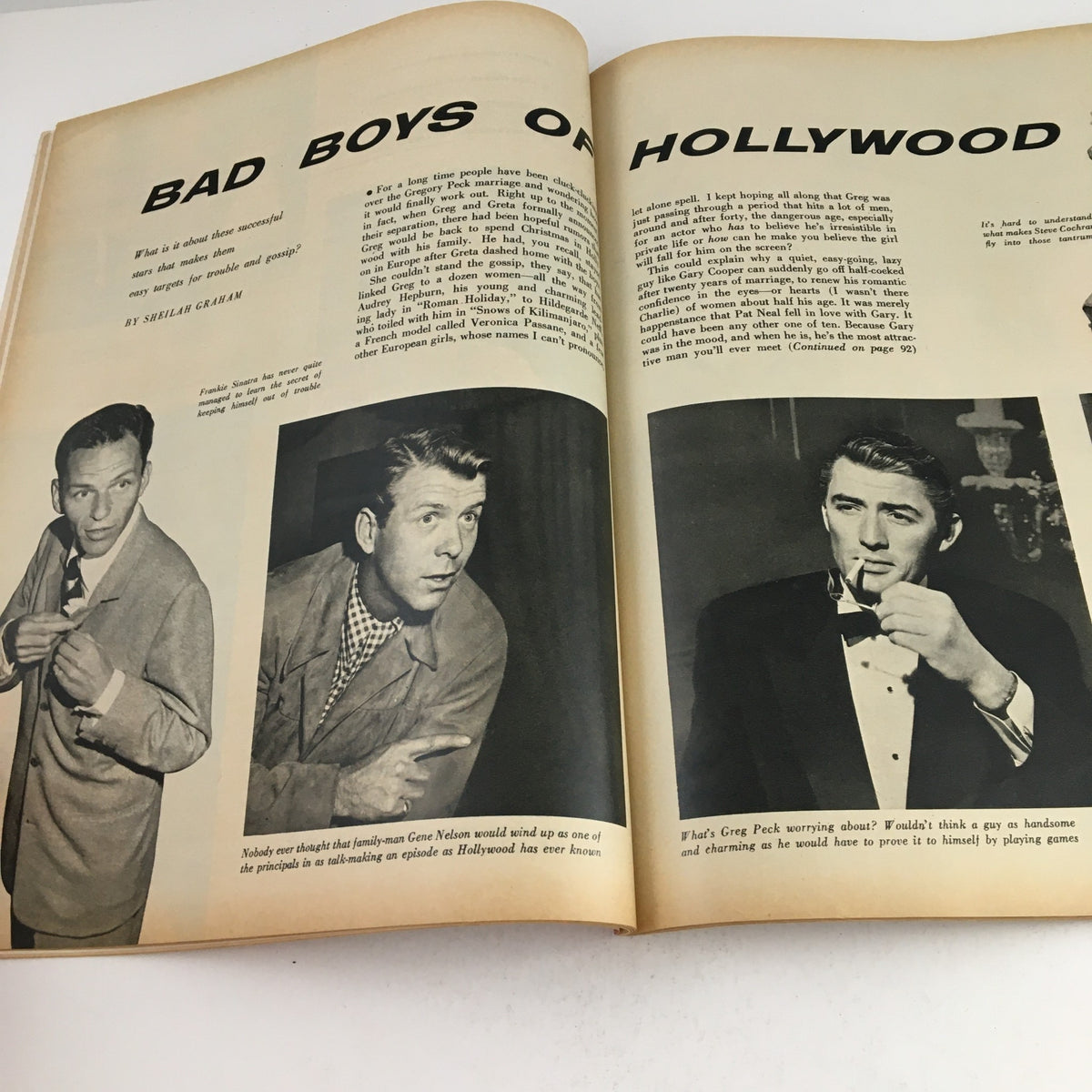 Feature article titled 'Bad Boys of Hollywood' in Photoplay Magazine December 1953, exploring Hollywood actors and their charisma alongside the Marilyn Monroe Pinup Calendar.