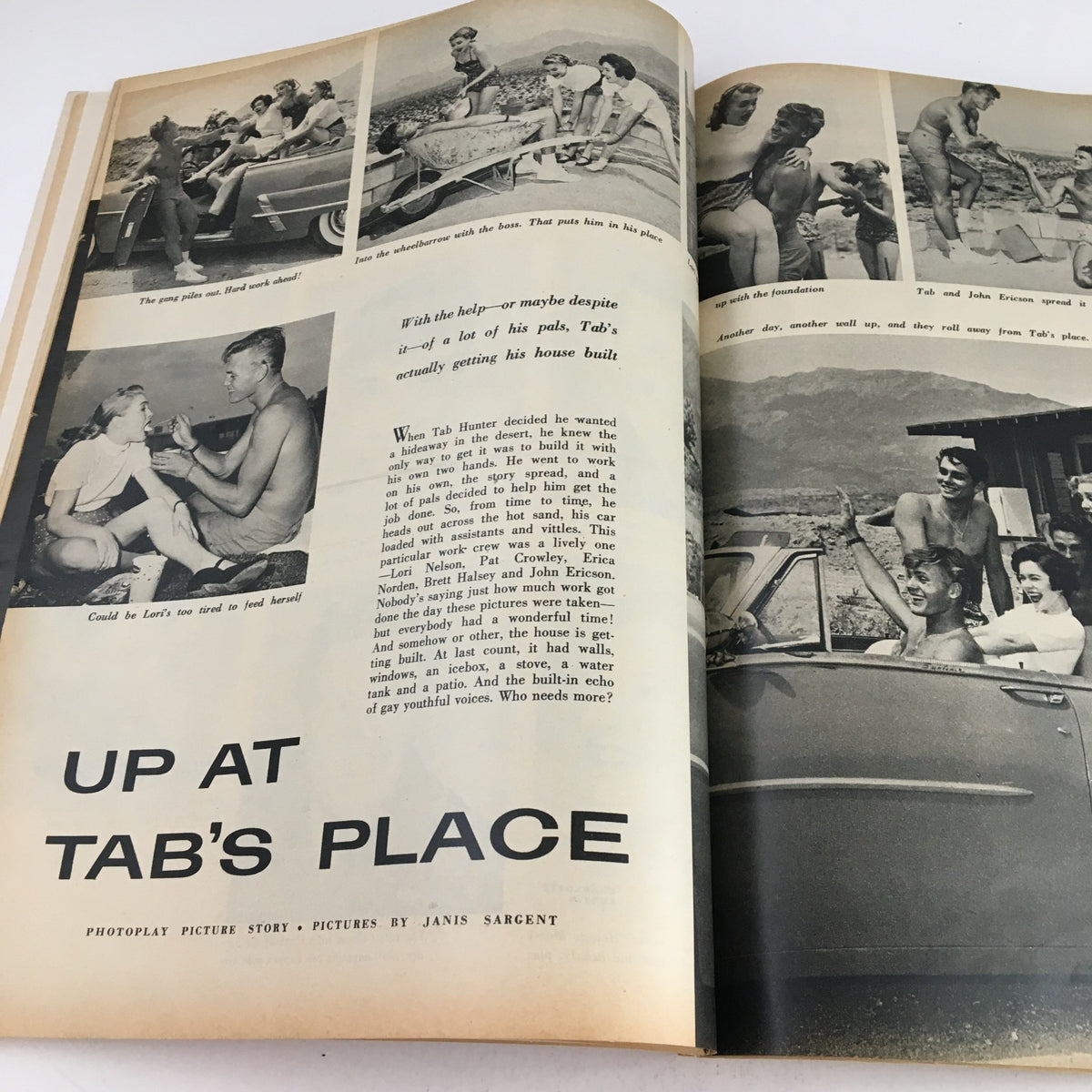 Interior page showcasing the Photoplay Magazine December 1953 with images of a beach social scene and discussions about Tab Hunter. This page highlights the Marilyn Monroe Pinup Calendar for 1954.