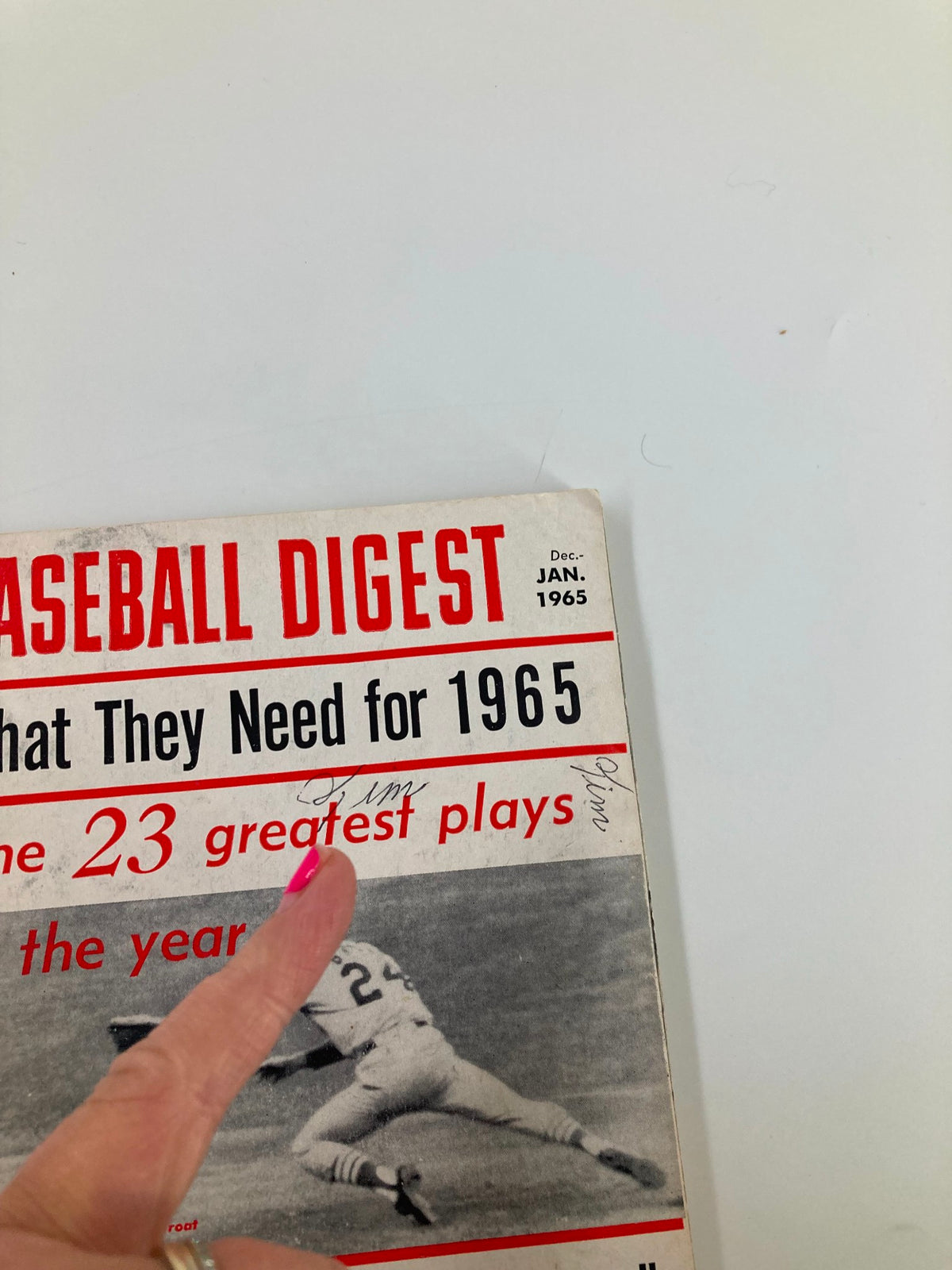 Cover of Vintage Baseball Digest January 1965 featuring the title and notable mention of the 23 greatest plays of the year, highlighted by the iconic player Dick Groat.