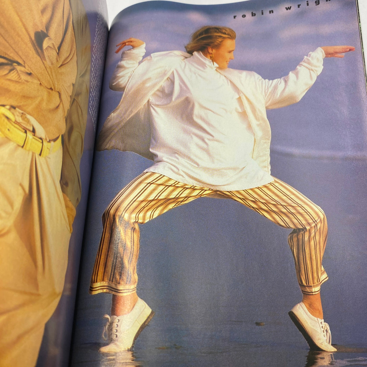 Vintage Vogue Magazine January 1988 featuring a model in fashion photography by Richard Avedon, showcasing striped pants and a flowing white top, capturing the essence of 1980s fashion.