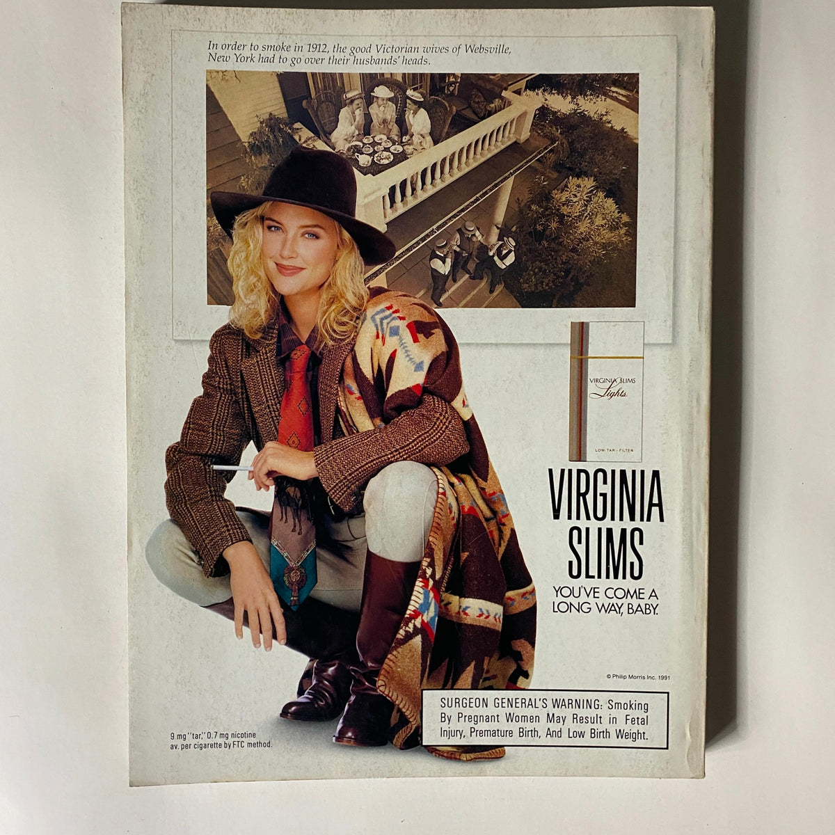 Vogue Magazine March 1991 presenting a vintage advertisement for Virginia Slims, featuring a fashionable model in a stylish outfit with a cowboy hat.