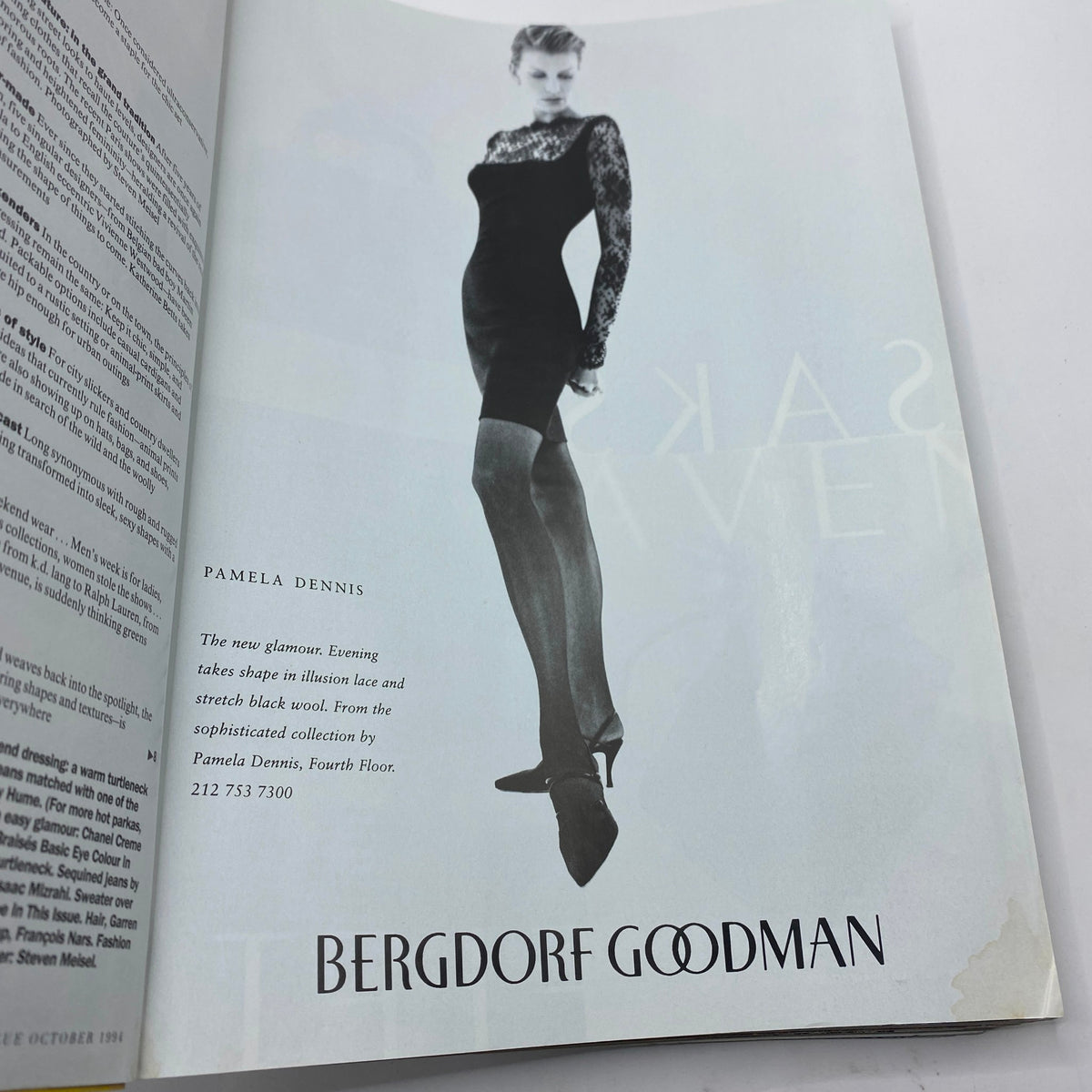 Advertisement page from Vogue Magazine October 1994 for Pamela Dennis featuring a model in a chic black evening dress, highlighting luxury fashion in the 90s.