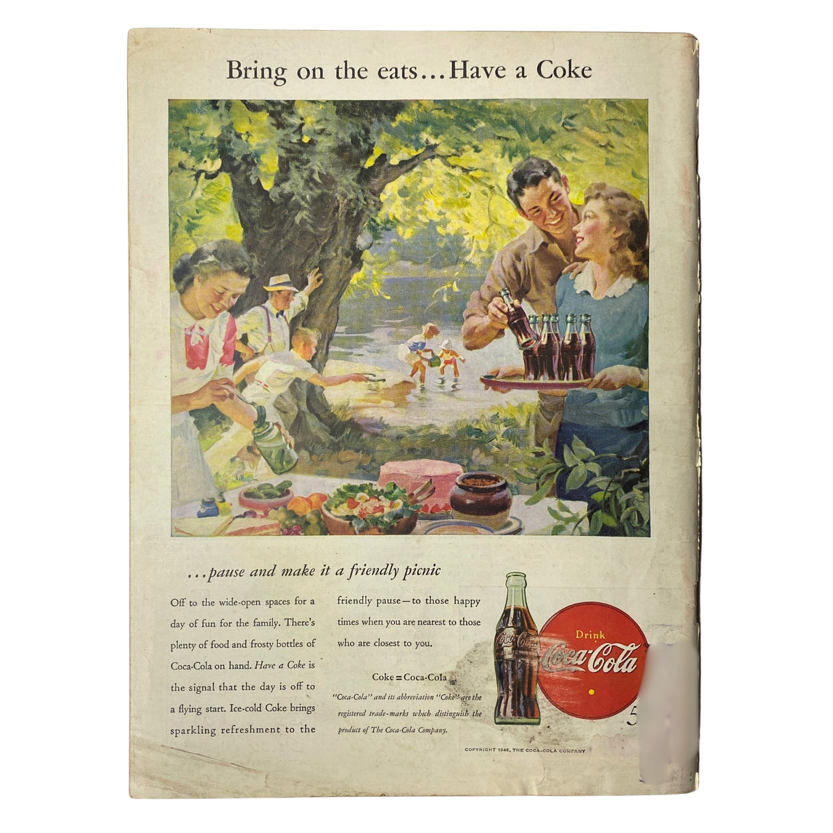 Vintage advertisement for Coca-Cola featuring a picnic scene with people enjoying food and drinks outdoors. The image promotes a friendly atmosphere alongside the tagline 'Bring on the eats...Have a Coke'.